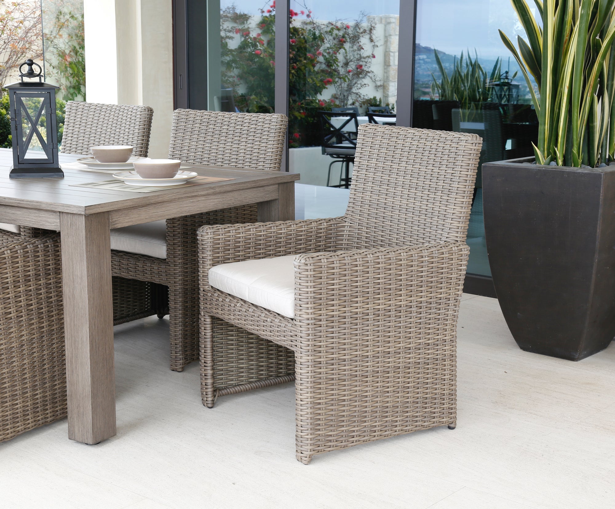 Sunset West Coronado Casual Dining Chair with Driftwood Resin Wicker and Comfortable Plush Seating for a Sophisticated Dining Experience